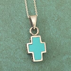 Sterling silver and turquoise cross pendant on sterling silver necklace